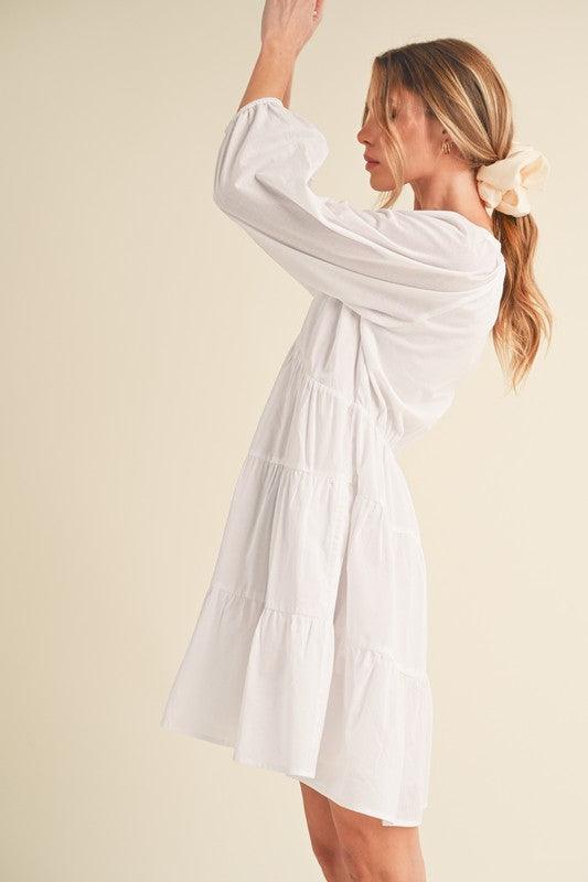 Aemi + Co Notched Balloon Sleeve Tiered Mini Dress - Purely Goods