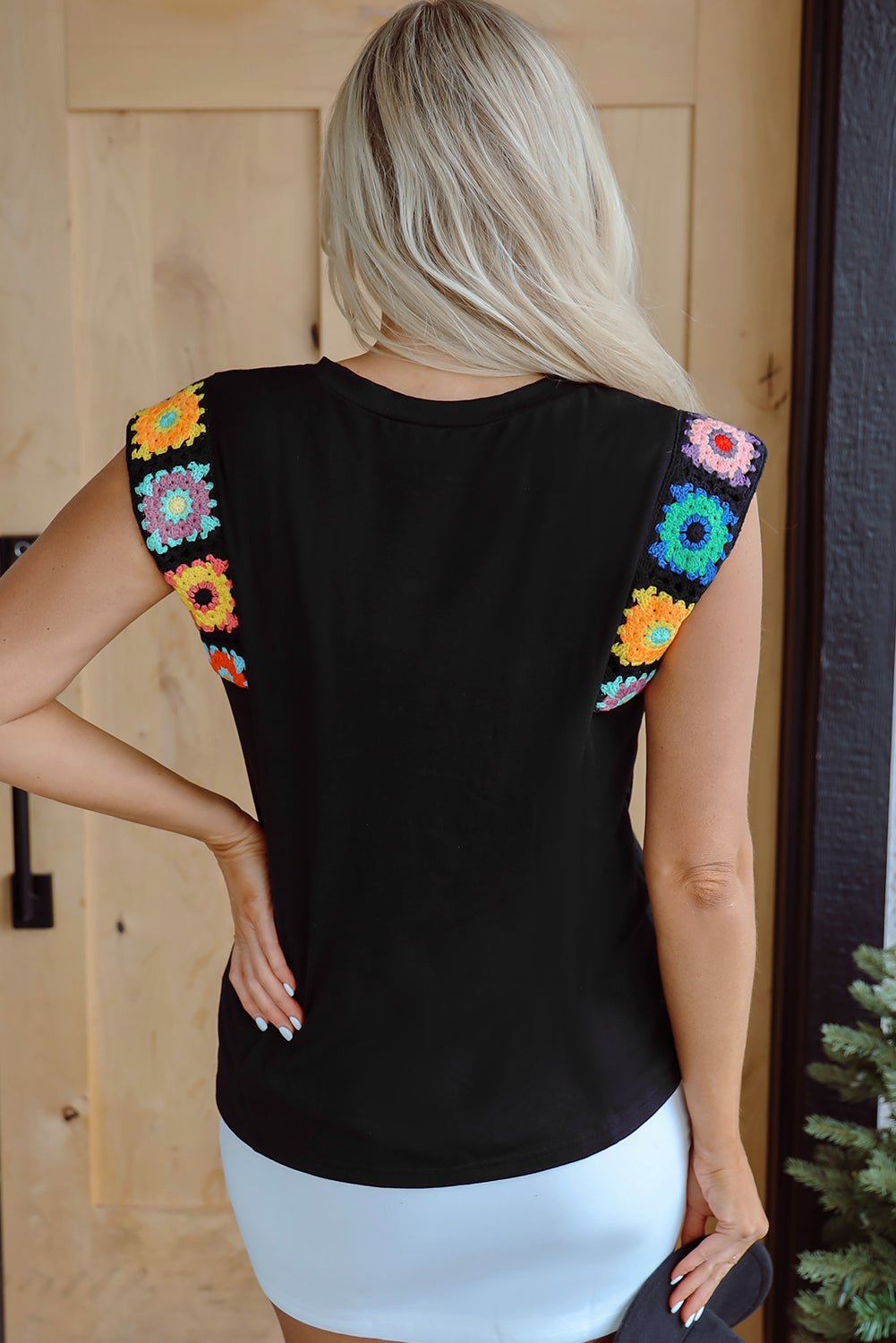 Threaded Pear black floral crochet tank top back view showing colorful granny square sleeve details