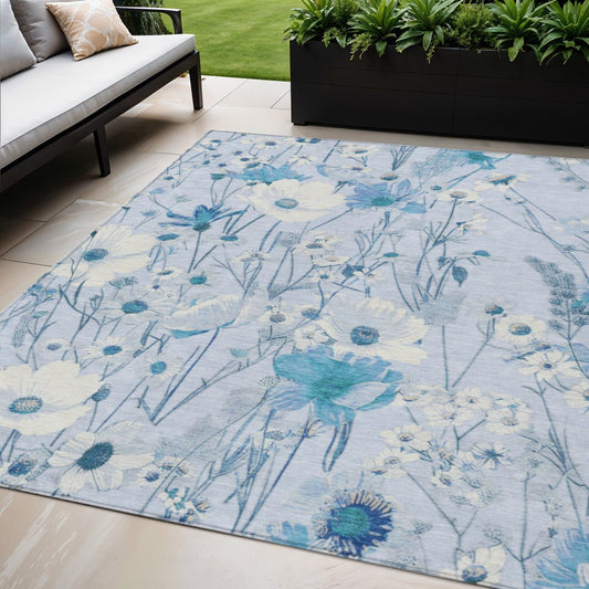 Homeroots sky blue floral washable area rug on patio under sofa with planter outdoor floral design