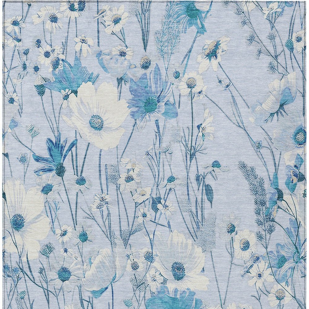 Homeroots sky blue floral washable area rug with delicate white and blue wildflowers on outdoor rug