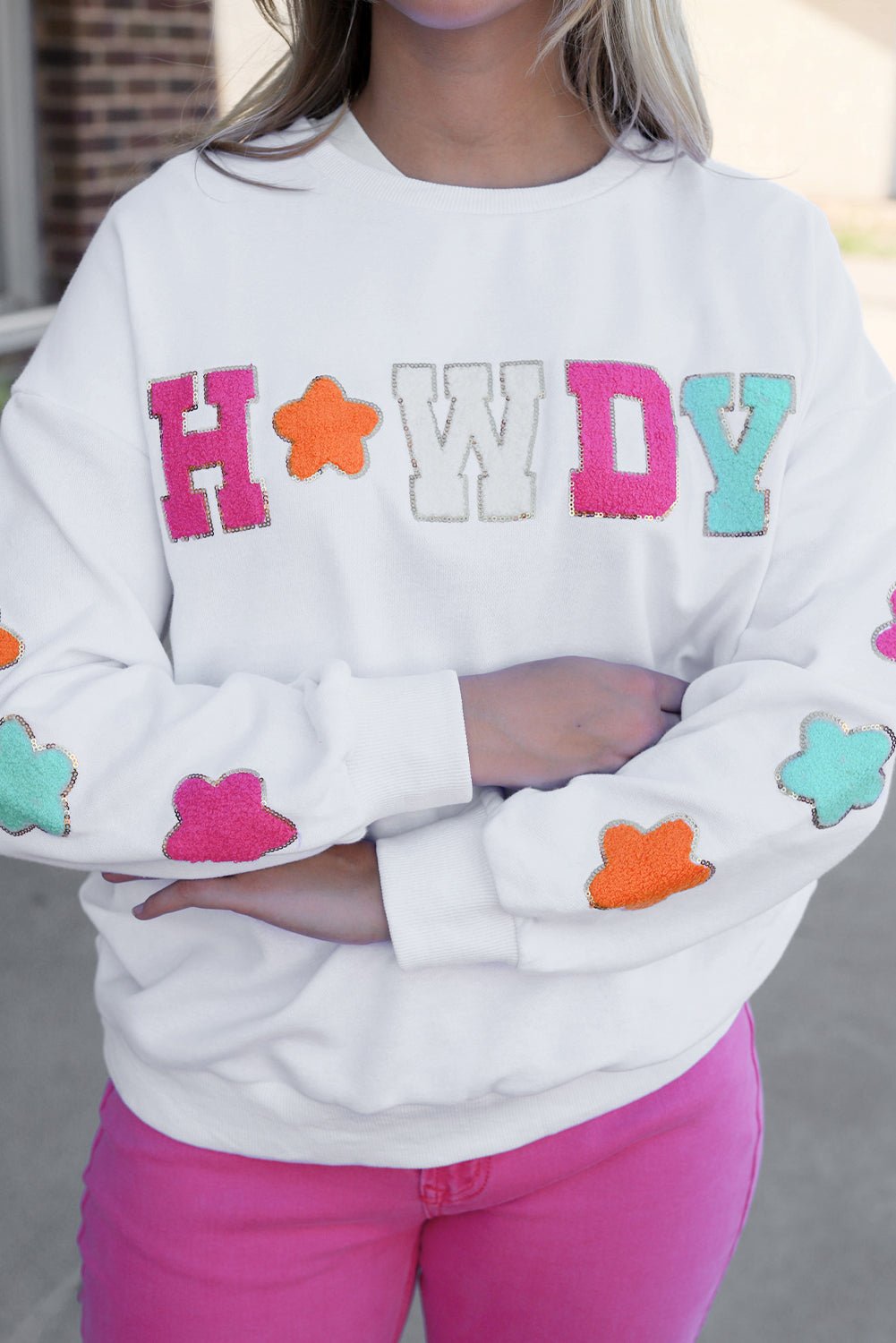 Threaded Pear Howdy patch sweatshirt white crewneck with colorful embroidered letters and sleeve flower patches